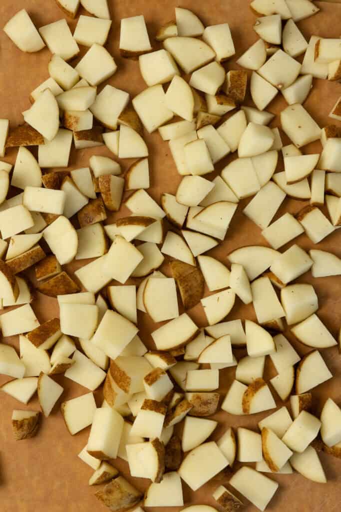 Potatoes diced in bite sized pieces.