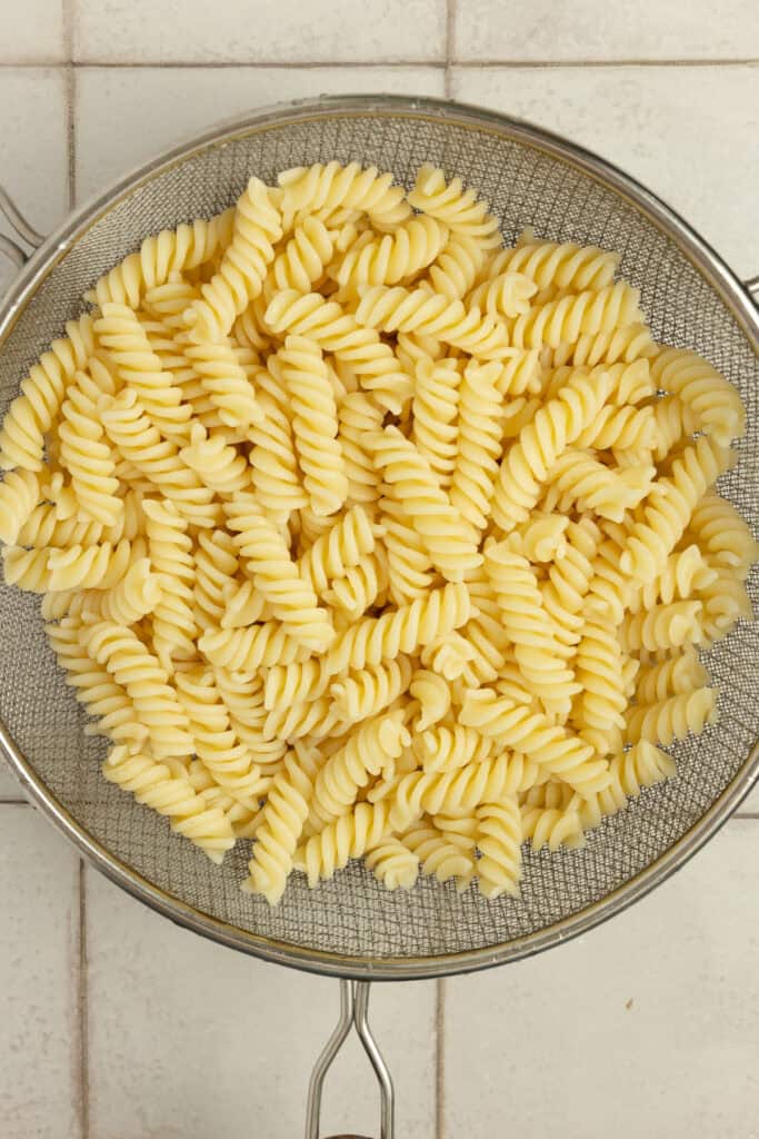 Cooked and drained pasta in a bowl.