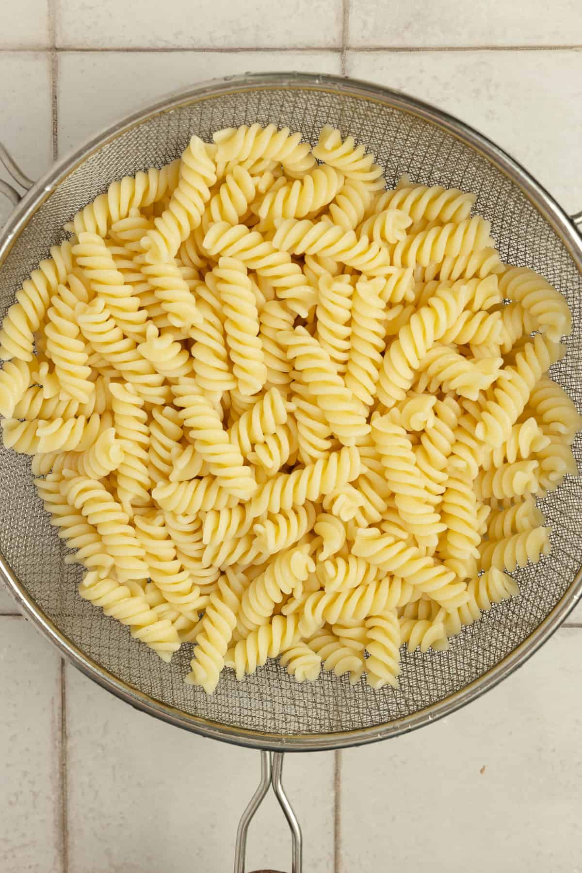 Cooked and drained pasta in a bowl.