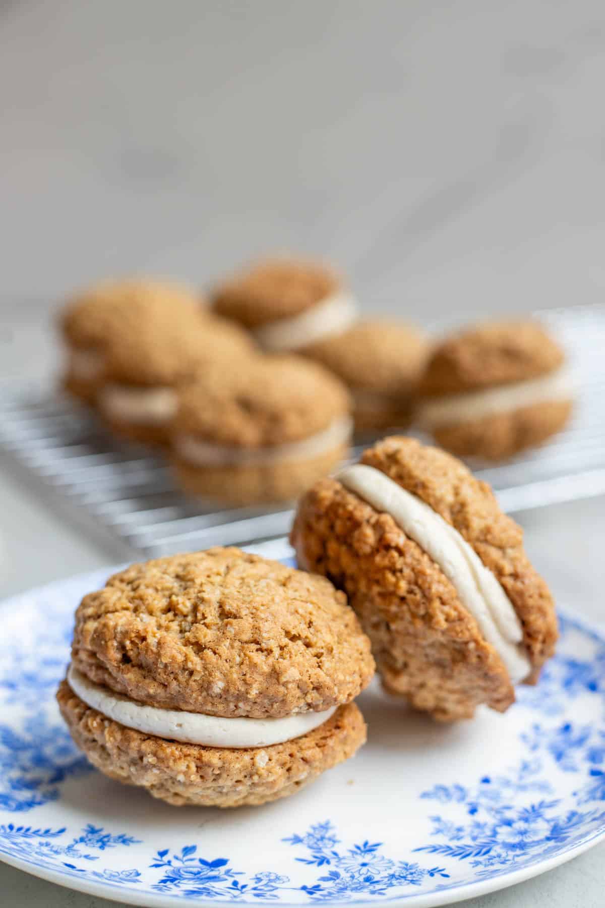 A blue plate full of sourdough oatmeal cream pies. 