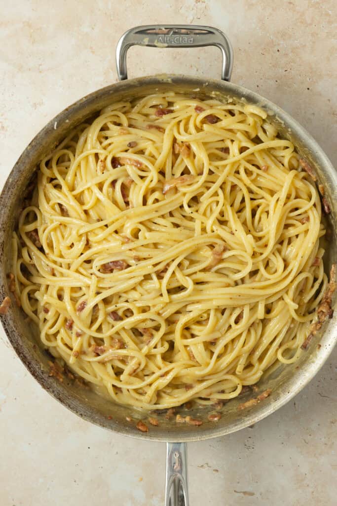 Pasta carbonara in a skillet.