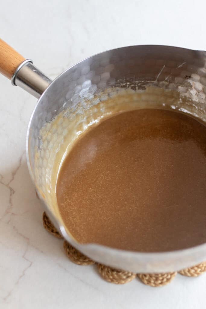 Caramel sauce in a pot.