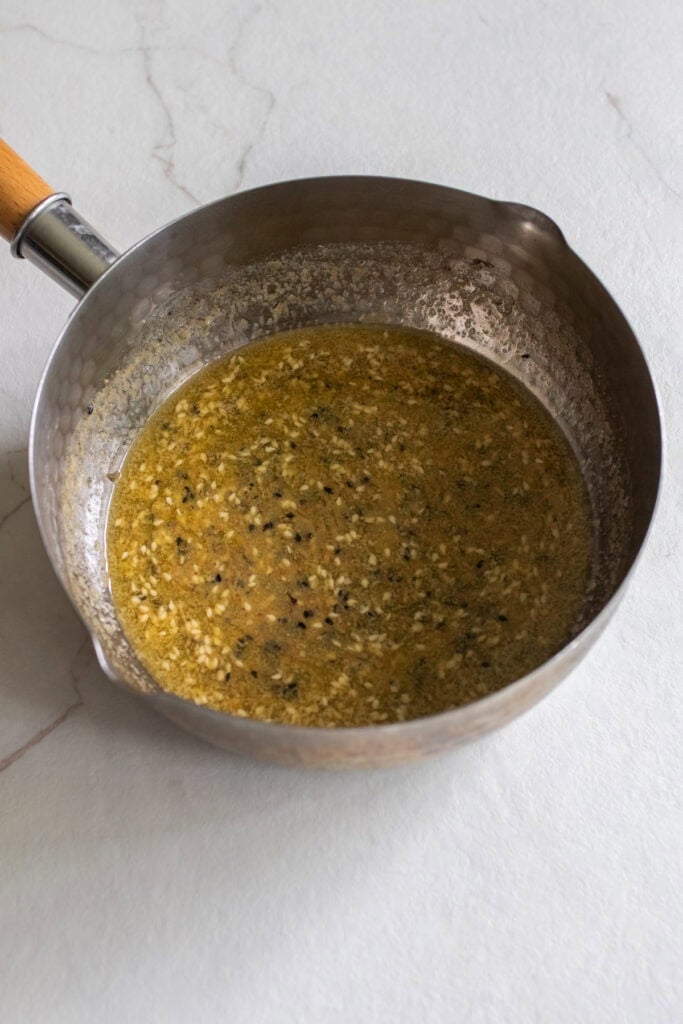 Melted butter and spices in saucepan.