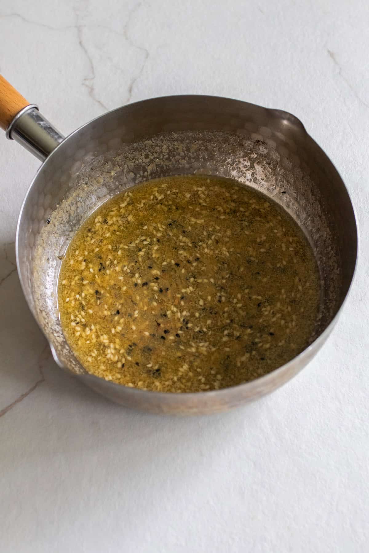 Melted butter and spices in saucepan.