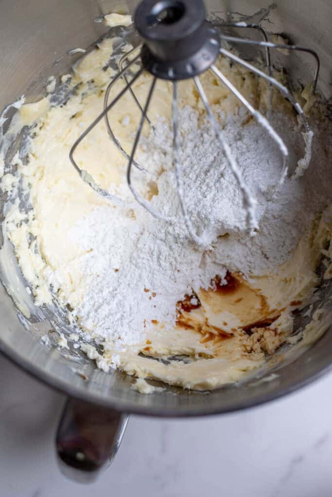 Butter and confectioners sugar in a large mixing bowl.