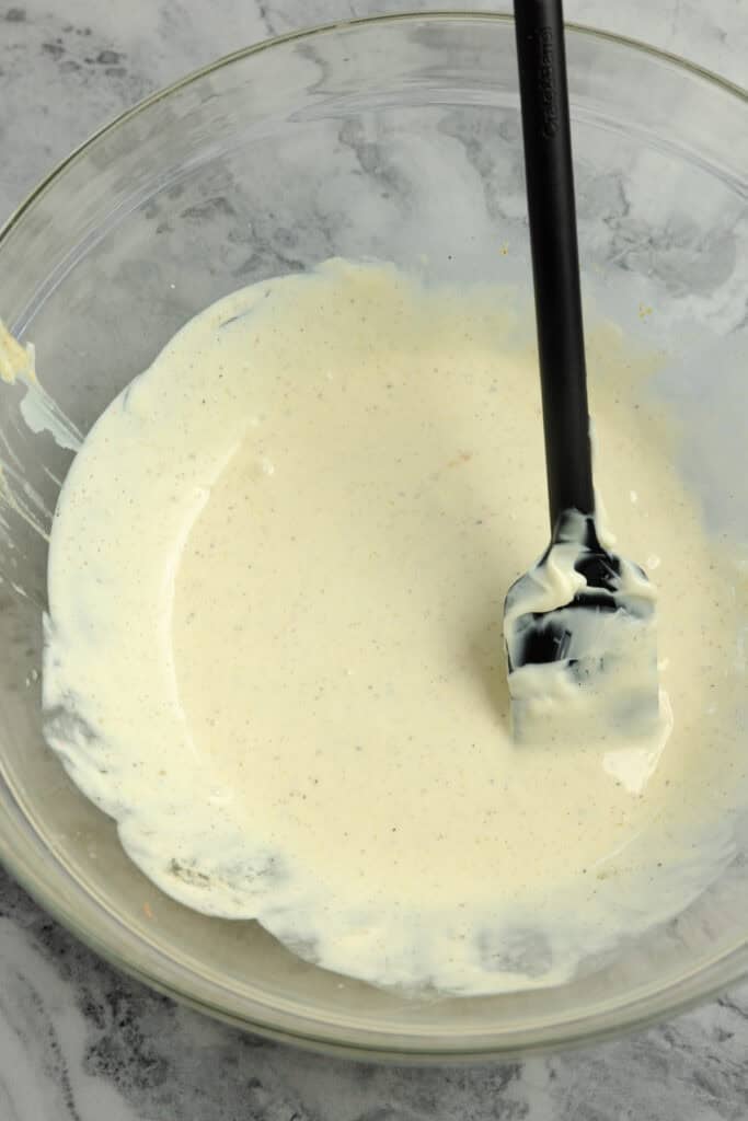Mustard, mayo, and apple cider vinegar mixed smooth as a dressing.