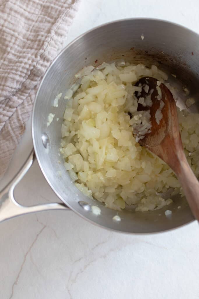 Onions and garlic in a small sauce pan.
