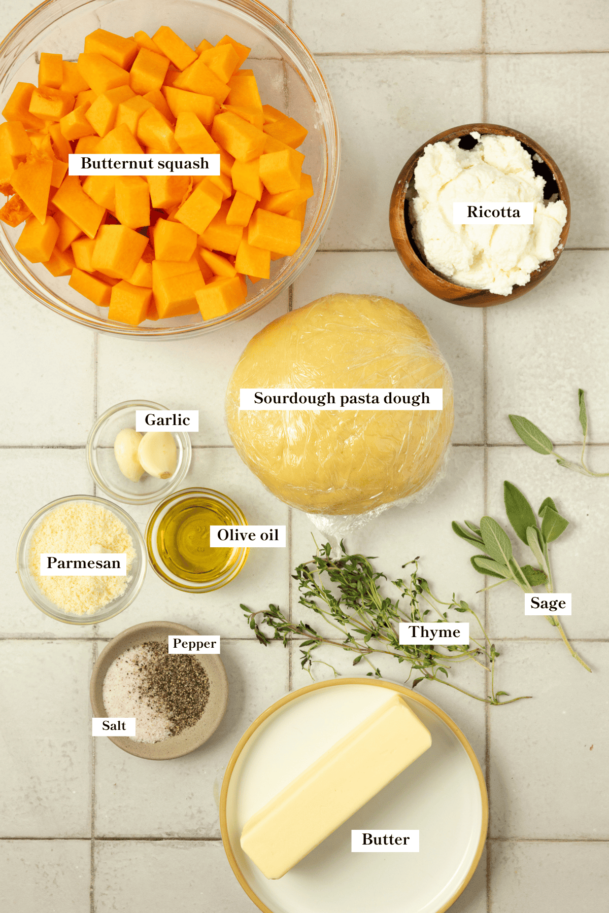 Squash, sourdough pasta, ricotta, herbs, and butter on the counter.
