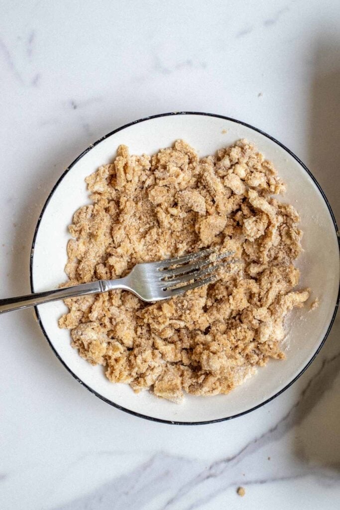 A sugary French toast topping mixed together in a bowl.