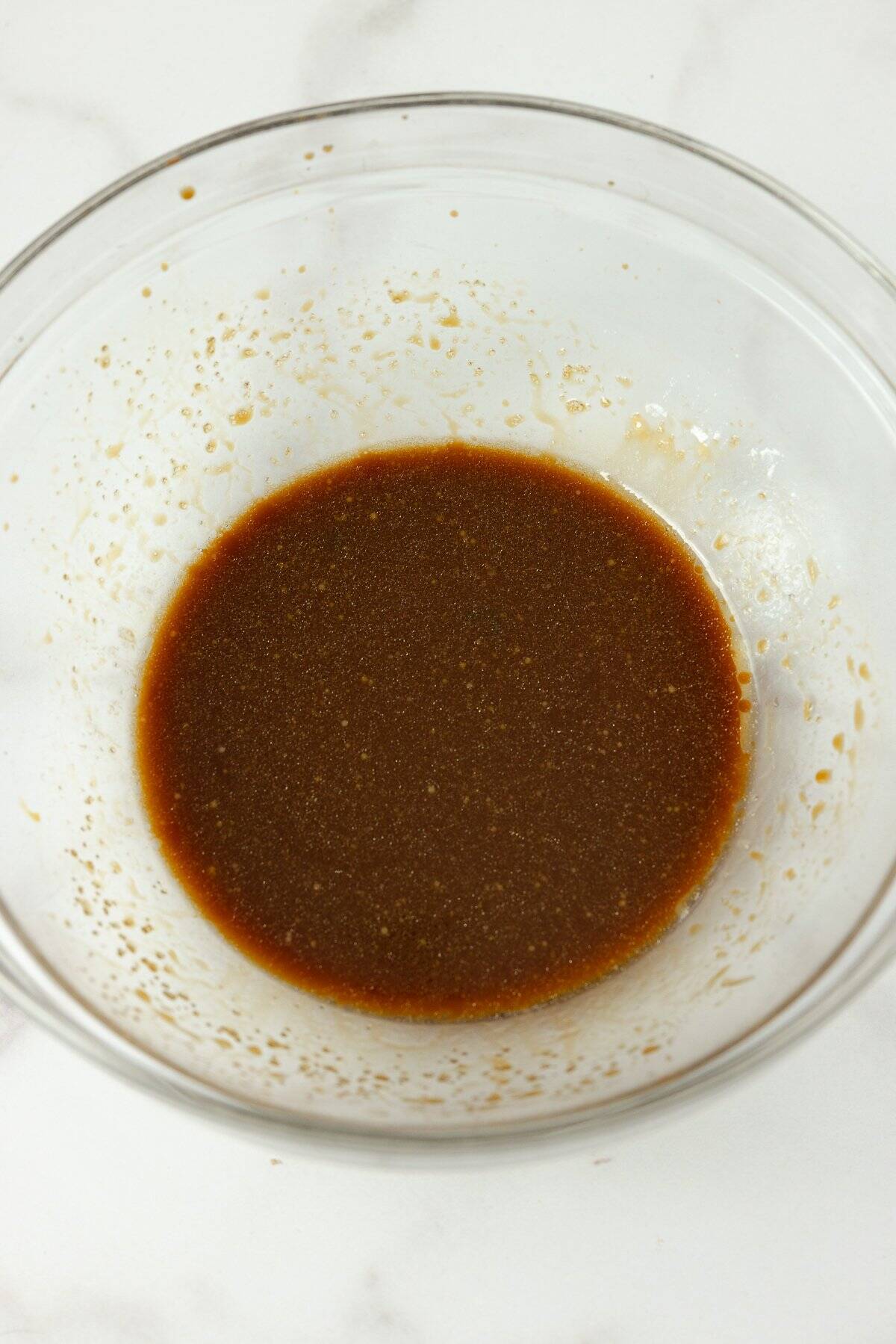 Korean beef sauce in a glass bowl.