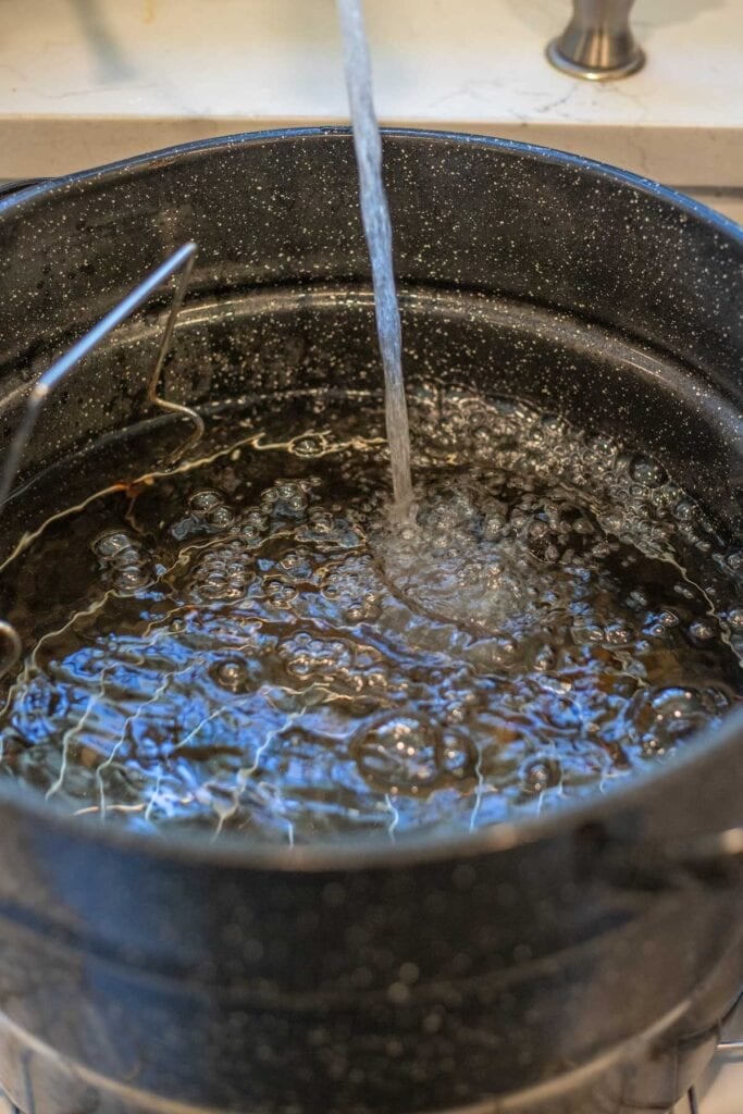 Boiling water in a large pot for canning.