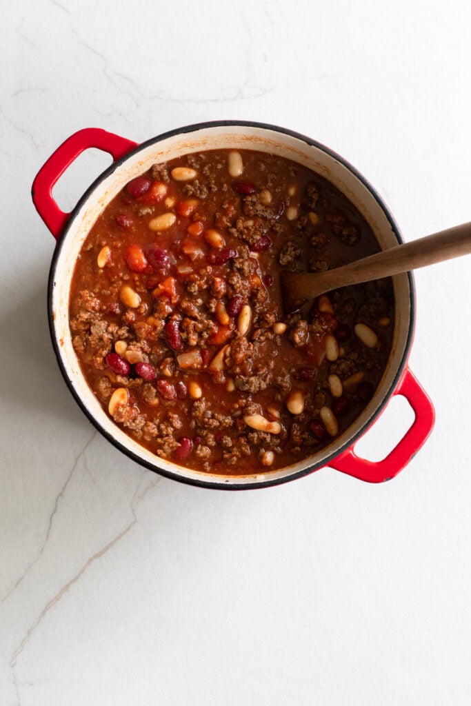 Simmering chili in a Dutch oven.
