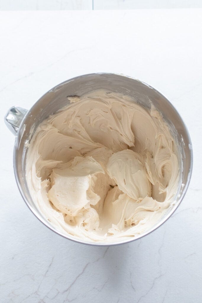 Cream cheese whipped in a stand mixer until it is fluffy.
