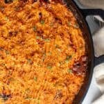 A skillet full of shepherds pie.