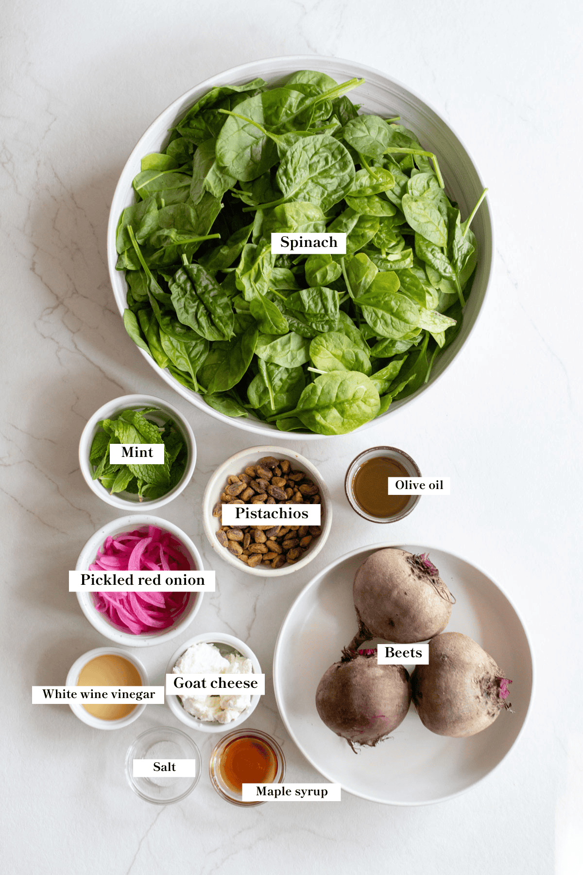 Ingredients for roasted beet salad on a countertop. 