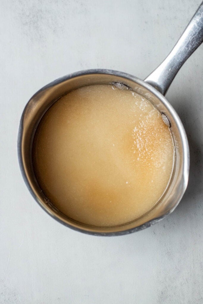 A pot of sugar and water.