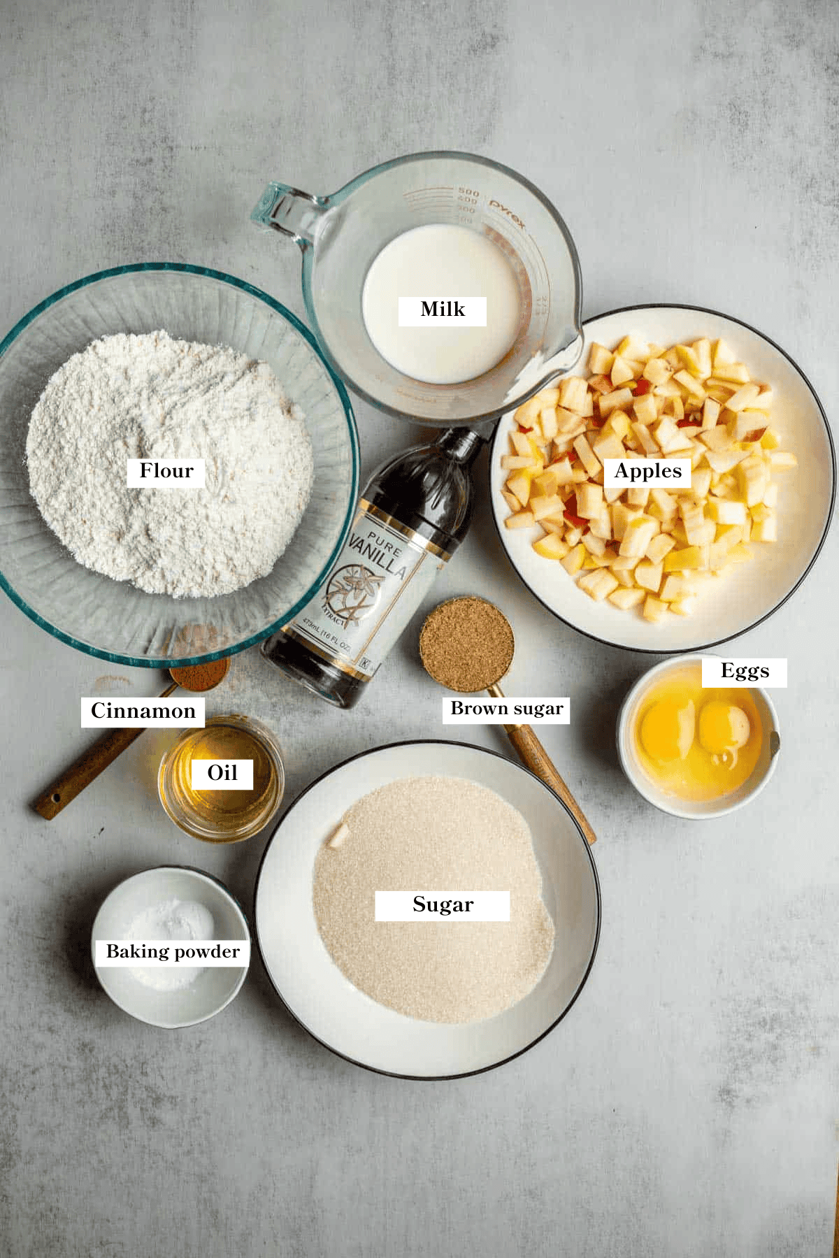 Ingredients for apple cinnamon muffins laid out on the kitchen counter.
