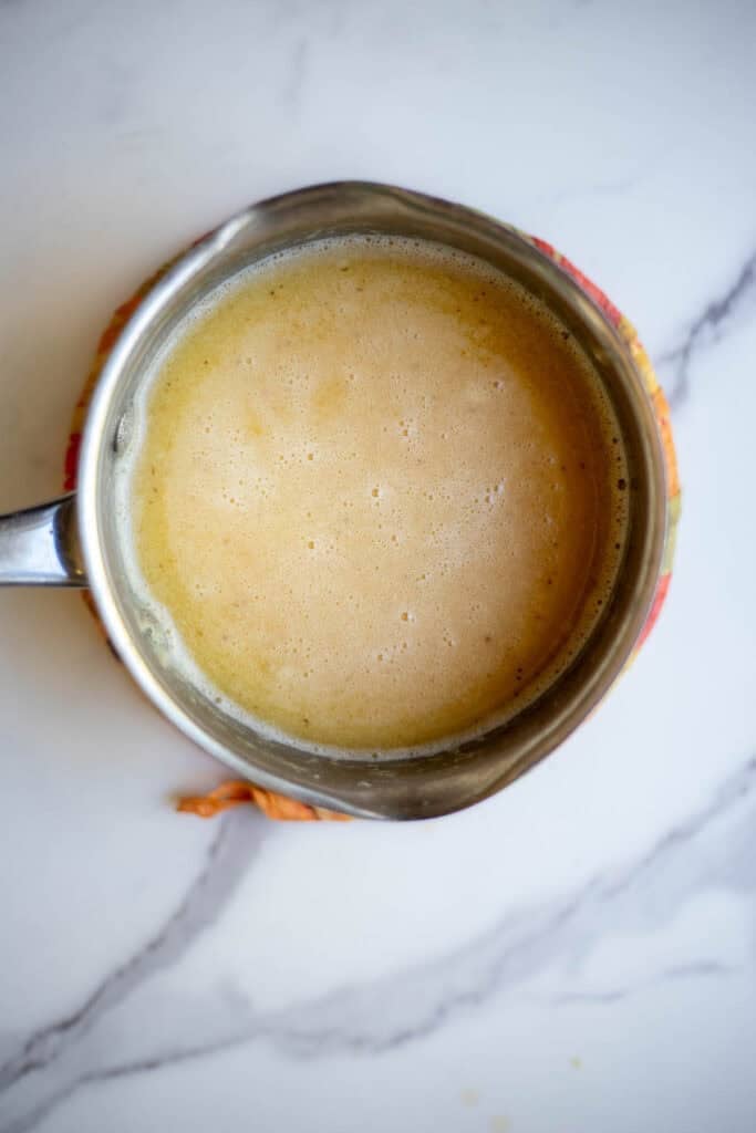 Broth and flour in a small sauce pan.