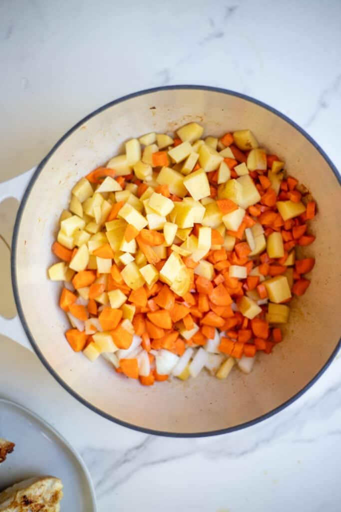 Vegetables in a Dutch oven.