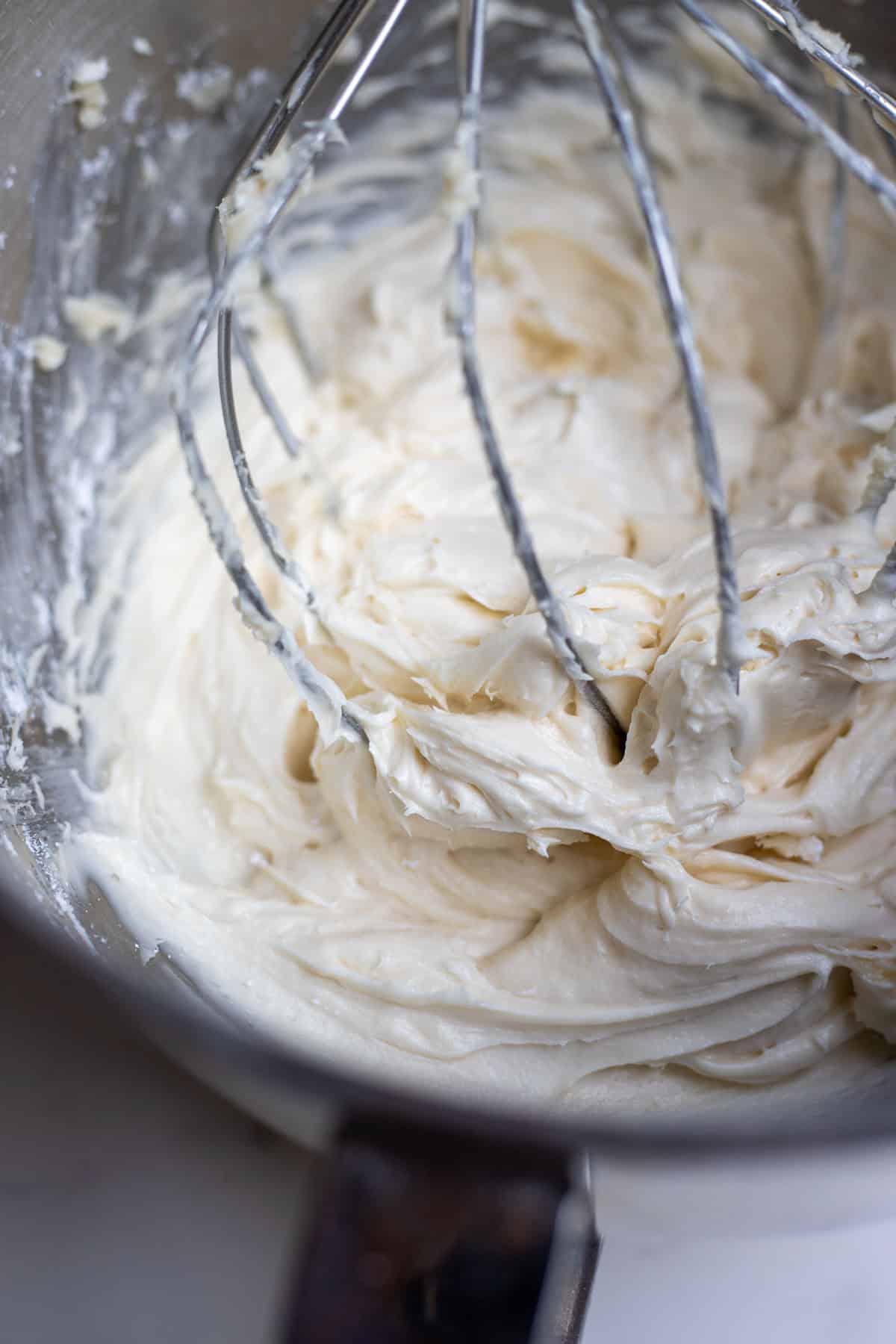 Cream cheese frosting whipped in the mixer until light and fluffy.