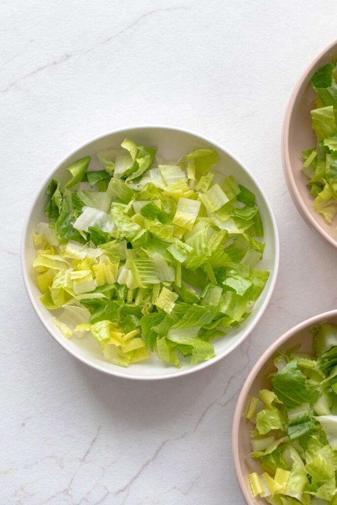 Bowls of lettuce. 