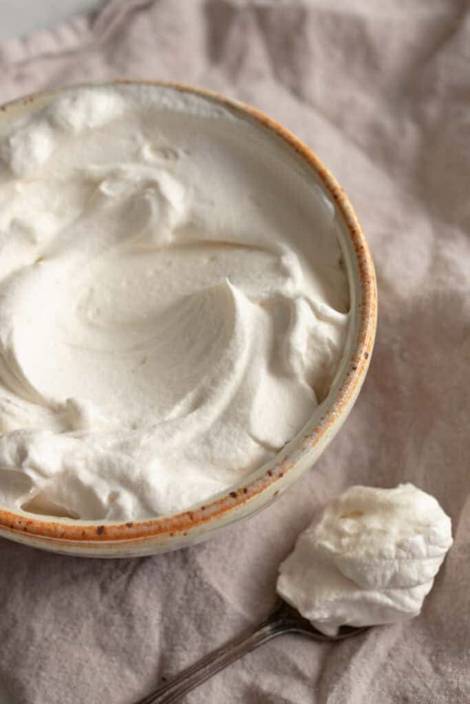 Whipped cream in a bowl.