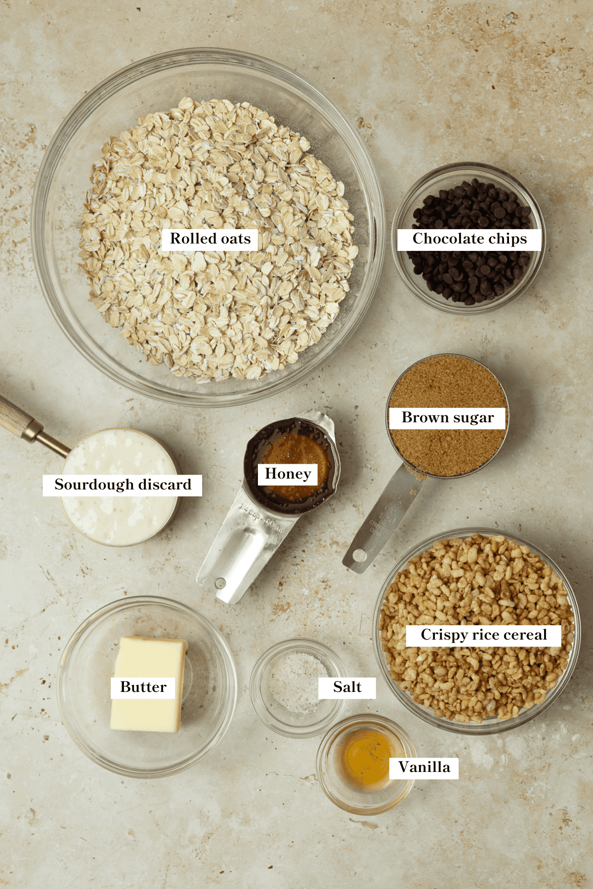 Ingredients for sourdough discard granola bars on a counter top.