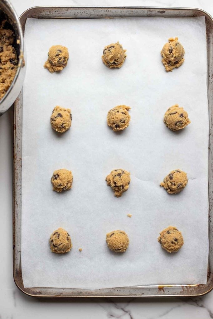 Dough balls on a cookie sheet.