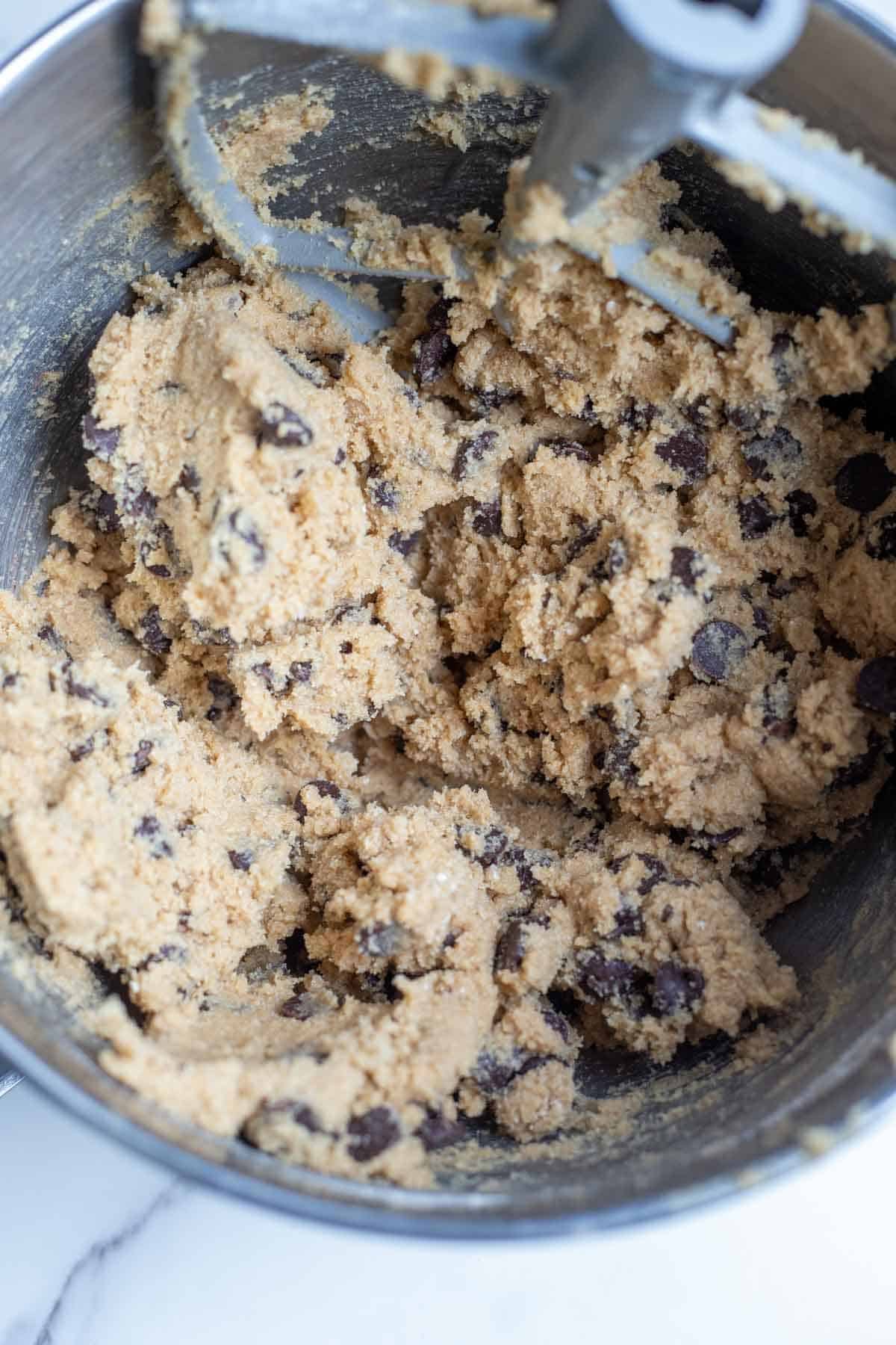 Chocolate chips added in a dough.