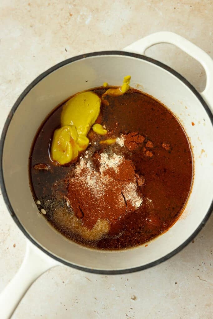 Sauces and spices in a sauce pan.