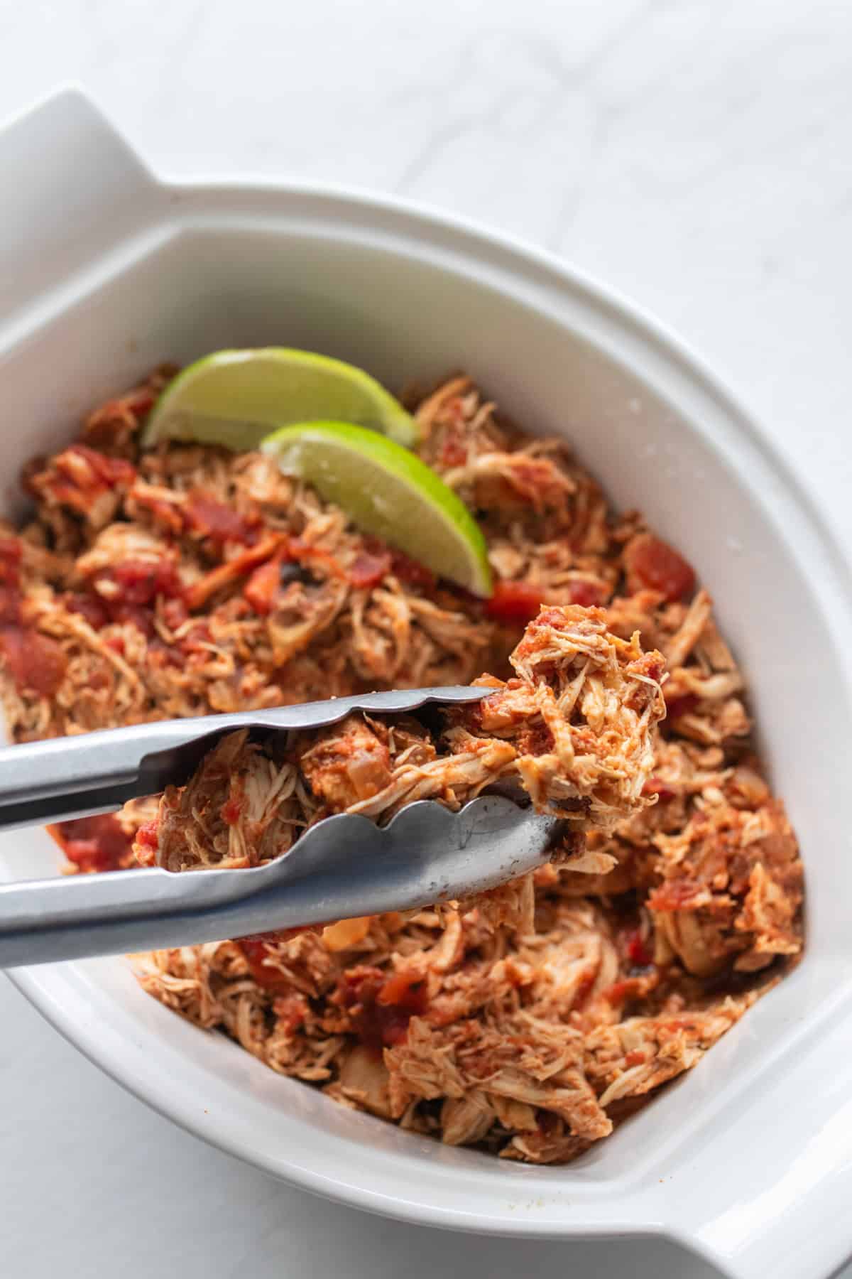 Shredded chicken in sauce.