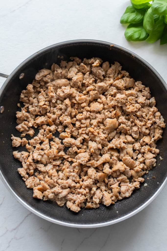 Sausage cooked in a skillet.