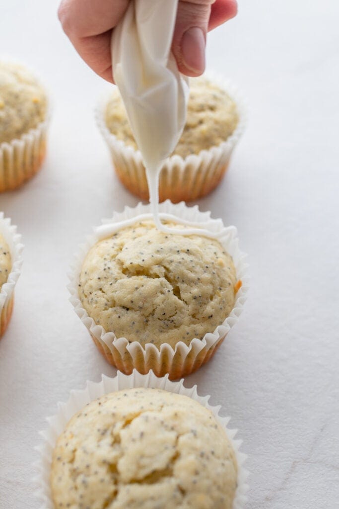 Muffin being glazed.