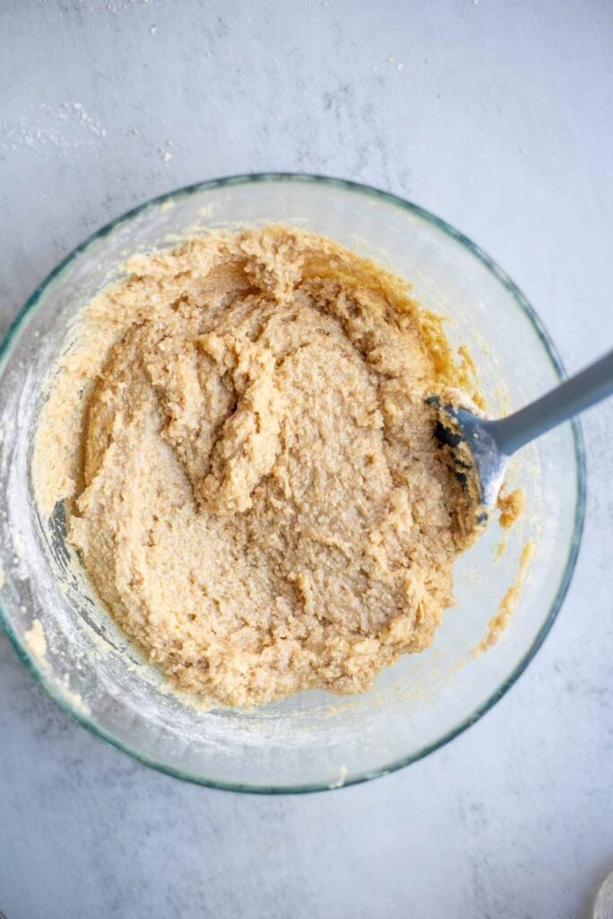 dry muffin ingredients mixed with wet muffin ingredients.