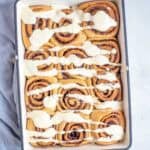 A casserole dish with cinnamon rolls.