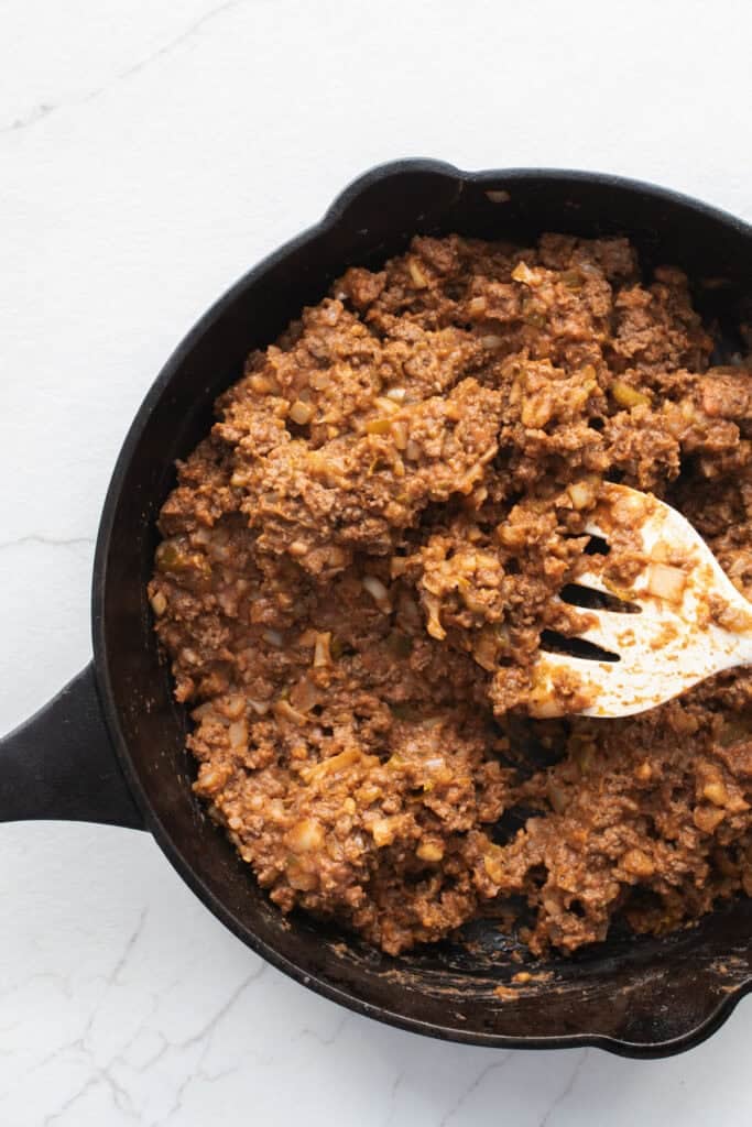 Beef mixture in cast iron skillet.