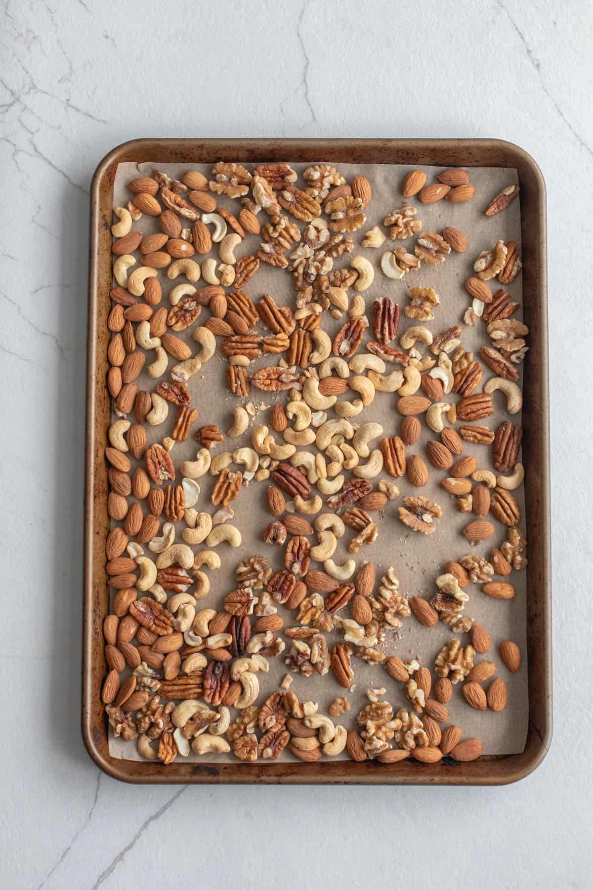 Nuts on a baking sheet.