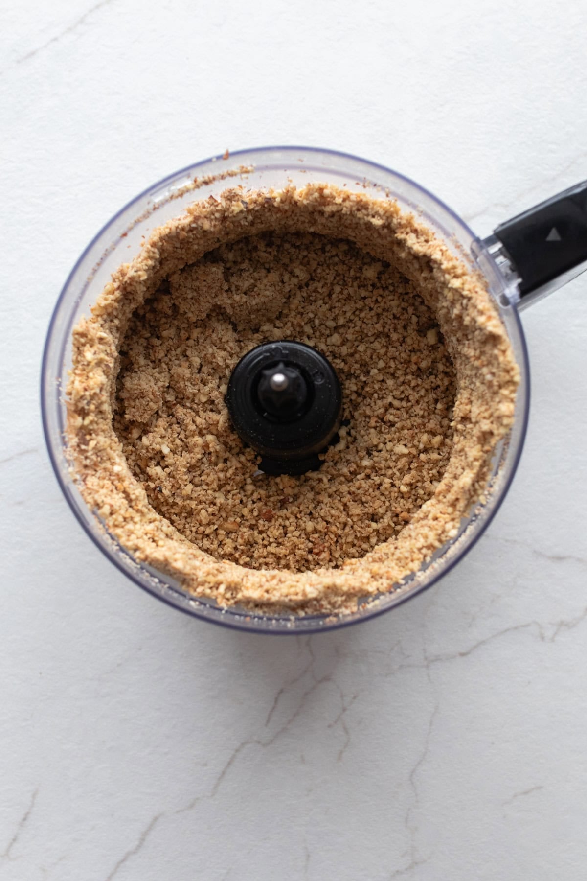 Roughly chopped nuts in a food processor.