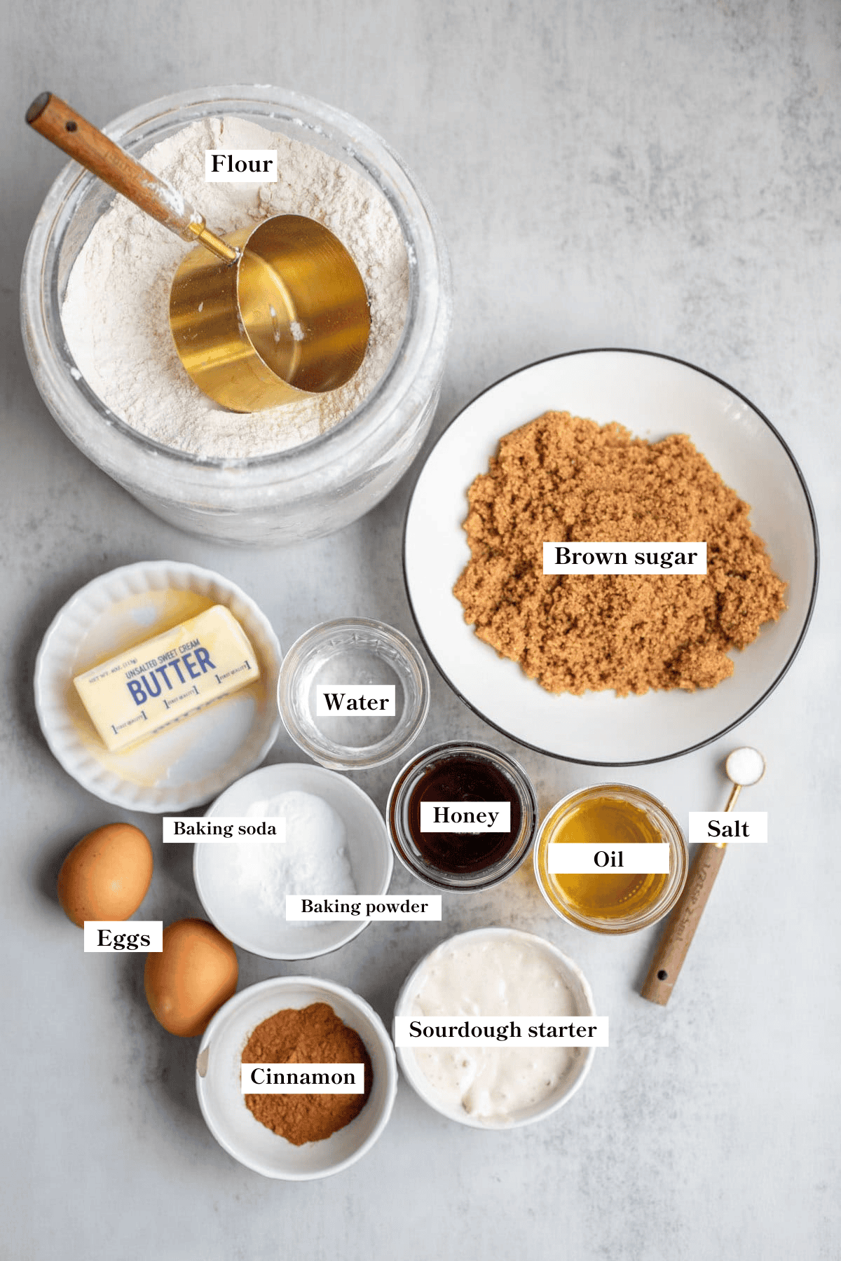 Ingredients for sourdough cinnamon rolls on a counter.