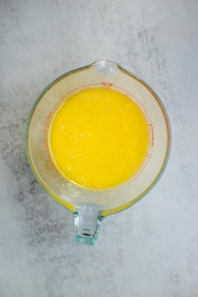 butter and milk melted in a glass measuring jar.