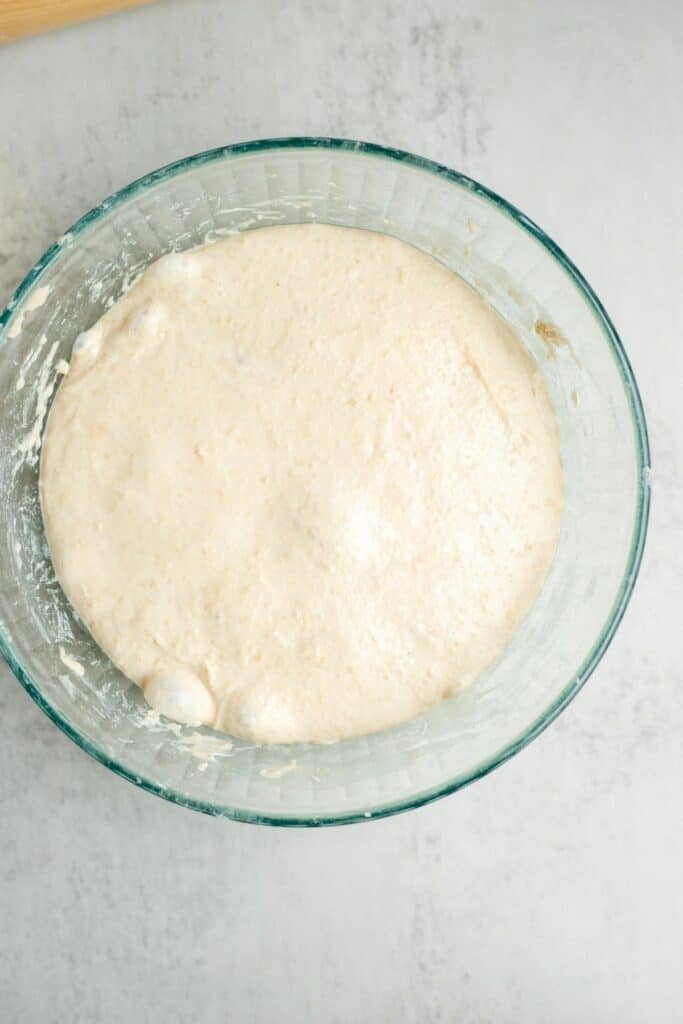 Sourdough dough in a bowl after a bulk fermentation.