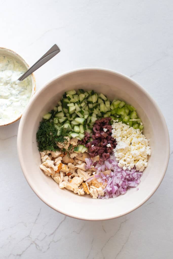 Chopped ingredients in a mixing bowl.