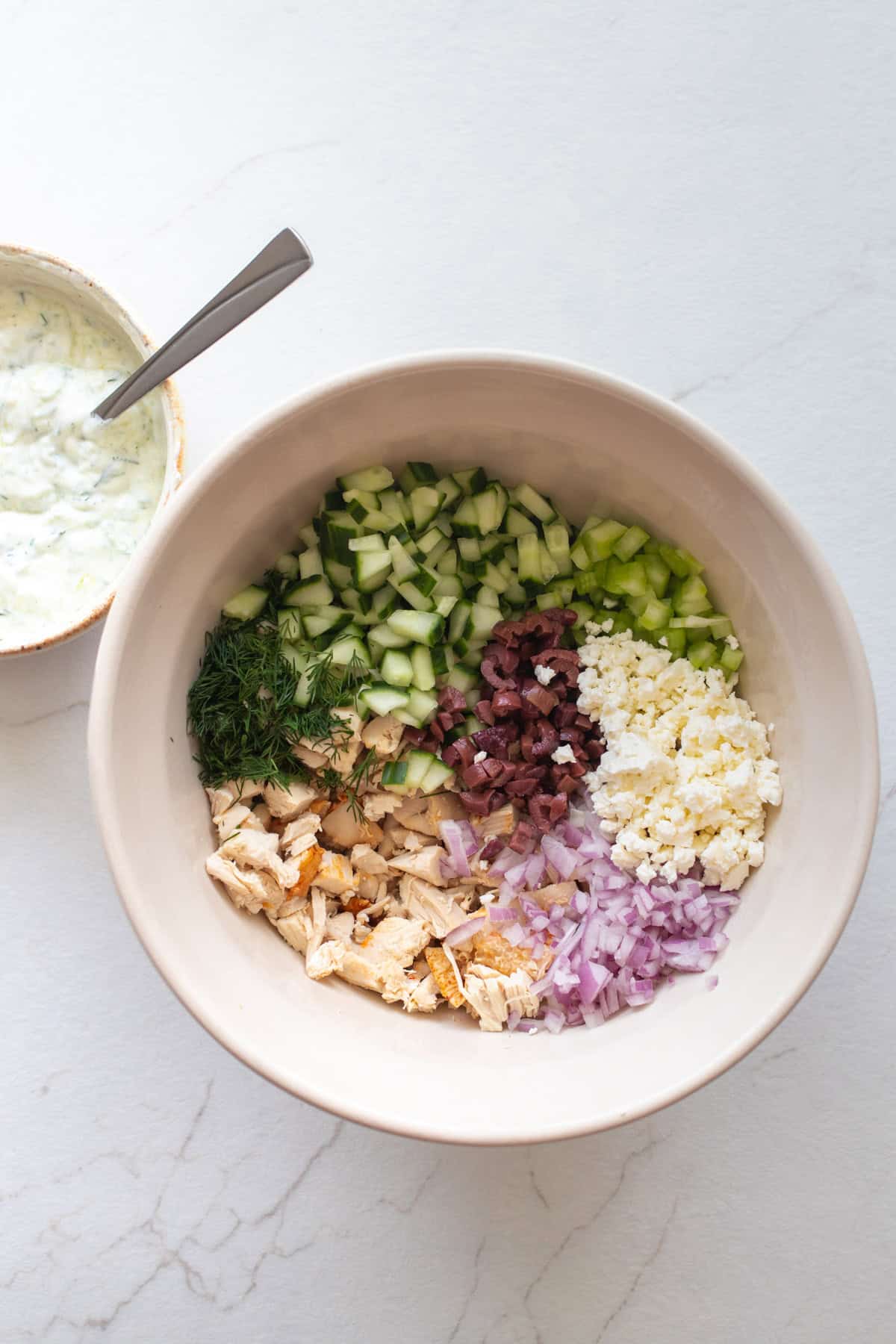 Chopped ingredients in a mixing bowl.