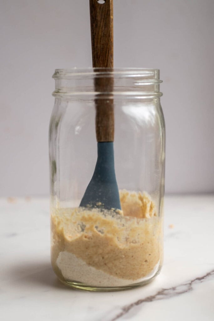 Stirring together flour and water.