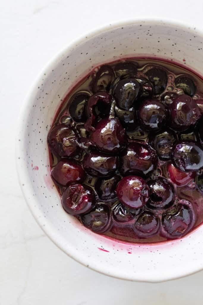 Cherries in a small bowl.