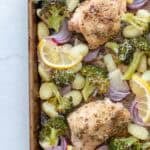 A sheet pan of homemade gnocchi, chicken, and veggies.