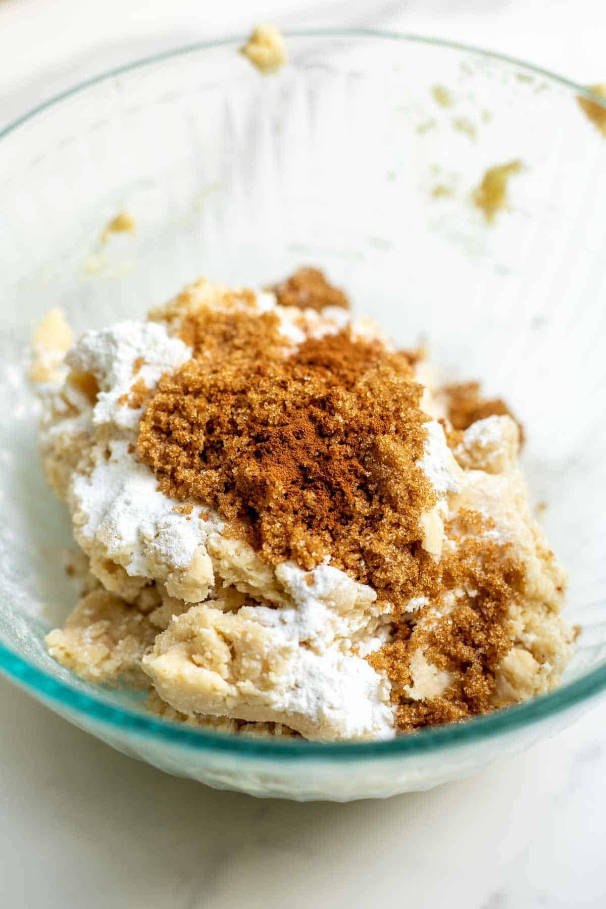 Baking soda, baking powder, salt, and brown sugar in a mixing bowl.