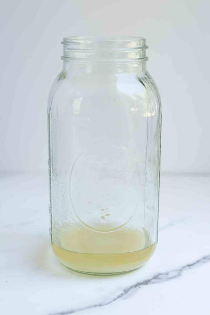 Boiled water and sugar in a half gallon mason jar. 