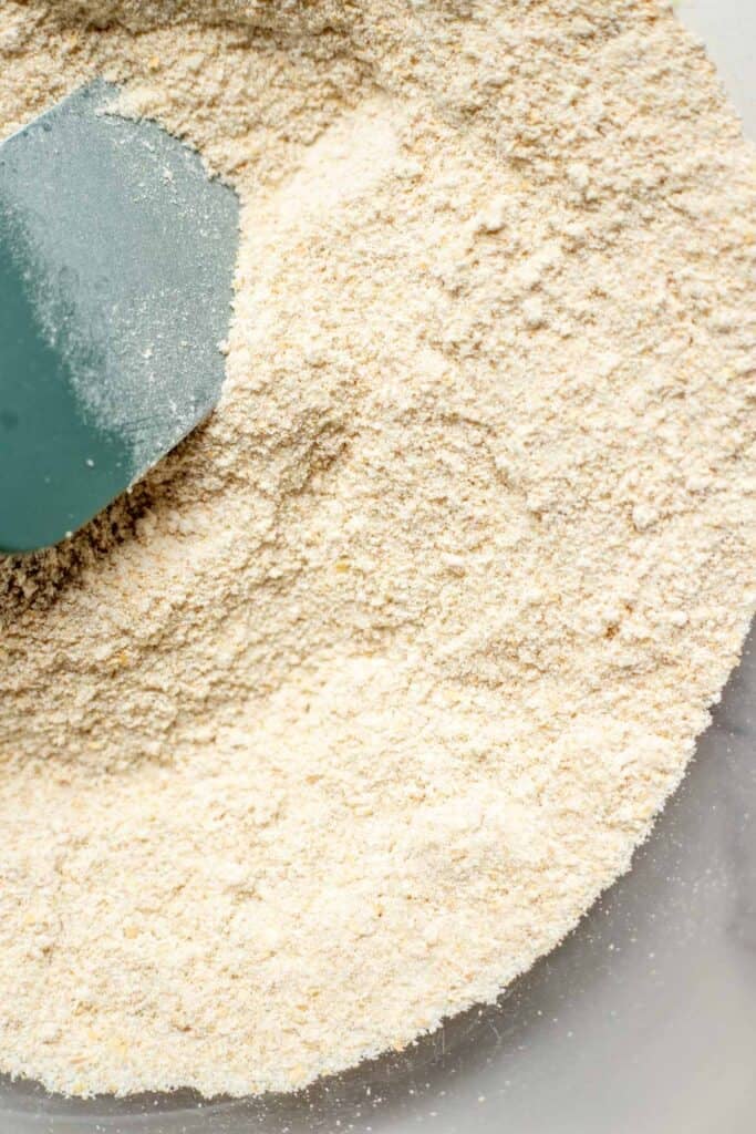 Dry ingredients to make a cobbler mixed together in a bowl.